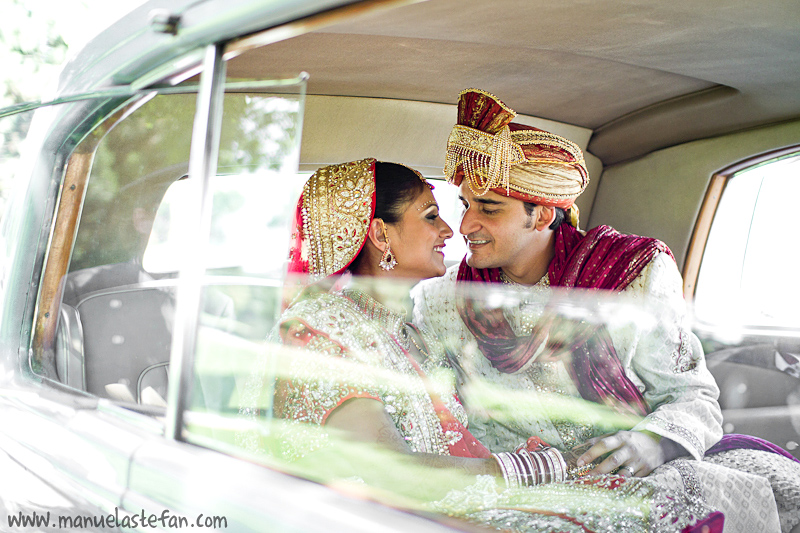 Indian bride and groom in Rolls Royce