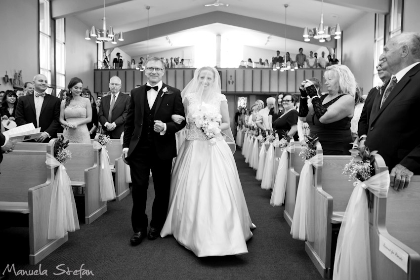 Bride and father walking down the isle