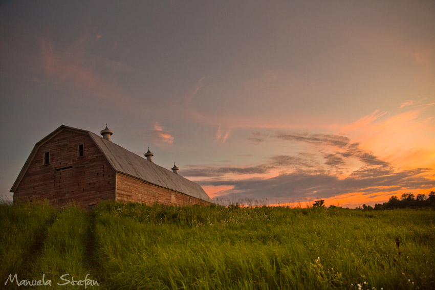 Sunset over old barn at Pine Brook Farm