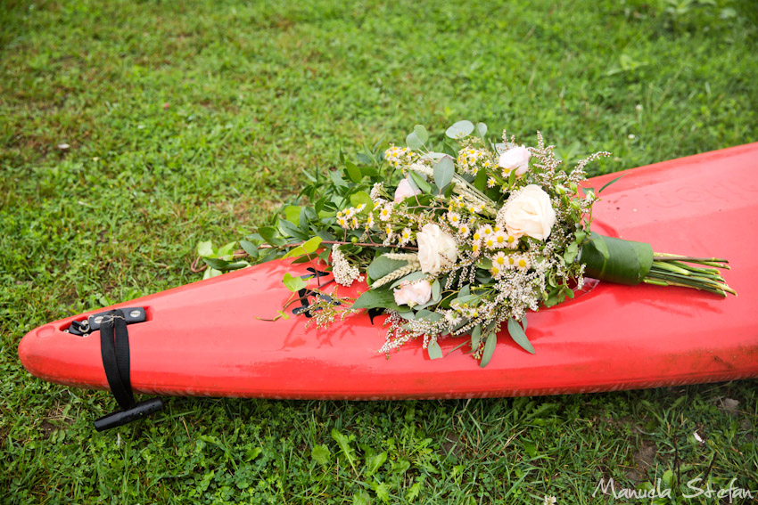 bridal bouquet and canoe