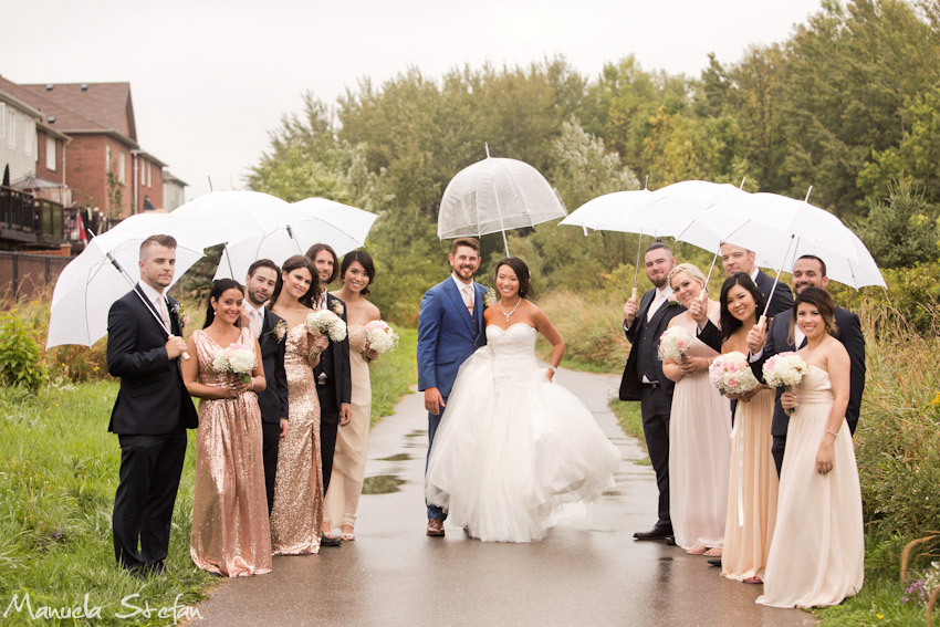 Wedding party photos in the rain